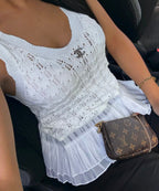 TOP CHANEL BLANC AVEC VOLANTS